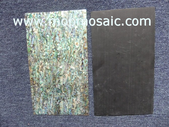 Red abalone shell laminate with black backing